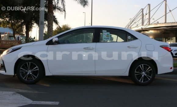 Buy Import Toyota Corolla White Car in Import - Dubai in Region of Bouenza Buy Import Toyota Corolla White Car in Import - Dubai in Region of Bouenza