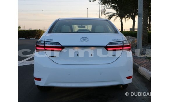 Buy Import Toyota Corolla White Car in Import - Dubai in Region of Bouenza Buy Import Toyota Corolla White Car in Import - Dubai in Region of Bouenza