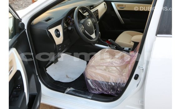 Buy Import Toyota Corolla White Car in Import - Dubai in Region of Bouenza Buy Import Toyota Corolla White Car in Import - Dubai in Region of Bouenza