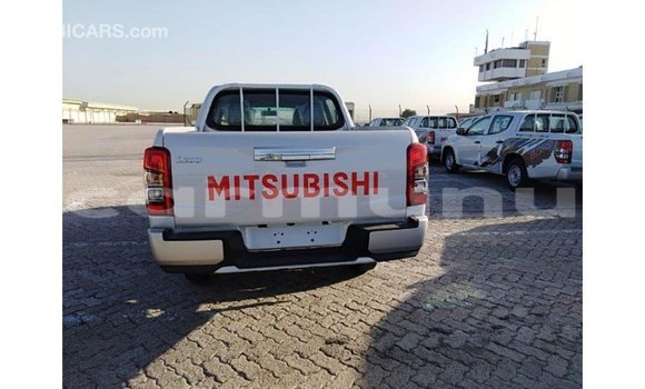 Buy Import Mitsubishi L200 White Car in Import - Dubai in Region of Bouenza Buy Import Mitsubishi L200 White Car in Import - Dubai in Region of Bouenza