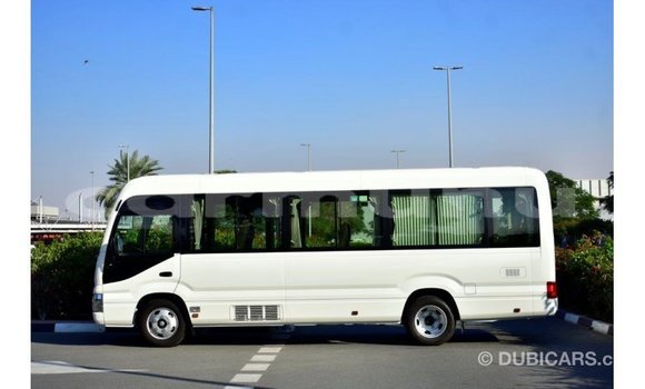 Buy Import Toyota Coaster White Car in Import - Dubai in Region of Bouenza Buy Import Toyota Coaster White Car in Import - Dubai in Region of Bouenza