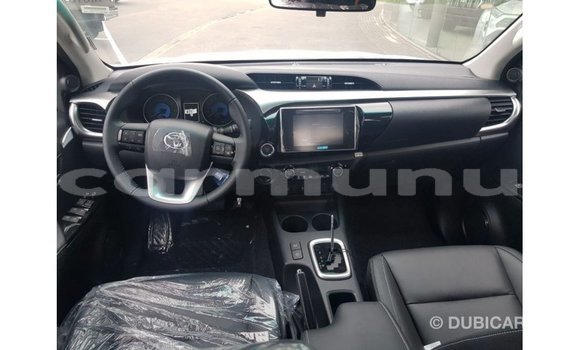 Buy Import Toyota Hilux Brown Car in Import - Dubai in Region of Bouenza Buy Import Toyota Hilux Brown Car in Import - Dubai in Region of Bouenza