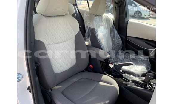 Buy Import Toyota Corolla White Car in Import - Dubai in Region of Bouenza Buy Import Toyota Corolla White Car in Import - Dubai in Region of Bouenza