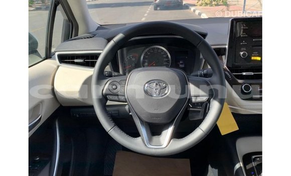 Buy Import Toyota Corolla White Car in Import - Dubai in Region of Bouenza Buy Import Toyota Corolla White Car in Import - Dubai in Region of Bouenza
