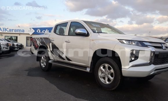 Acheter Import Voiture Mitsubishi L200 Blanc à Import - Dubai, Région de la Bouenza Acheter Import Voiture Mitsubishi L200 Blanc à Import - Dubai, Région de la Bouenza