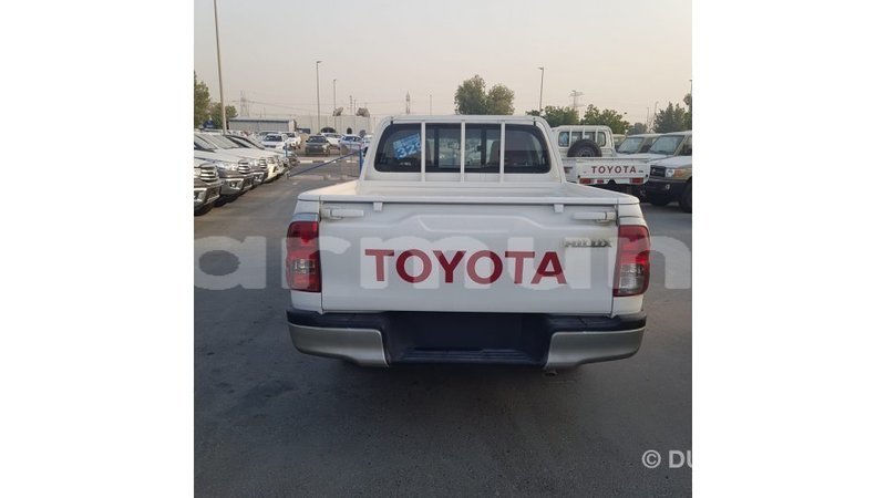 Big with watermark toyota hilux region of bouenza import dubai 3010