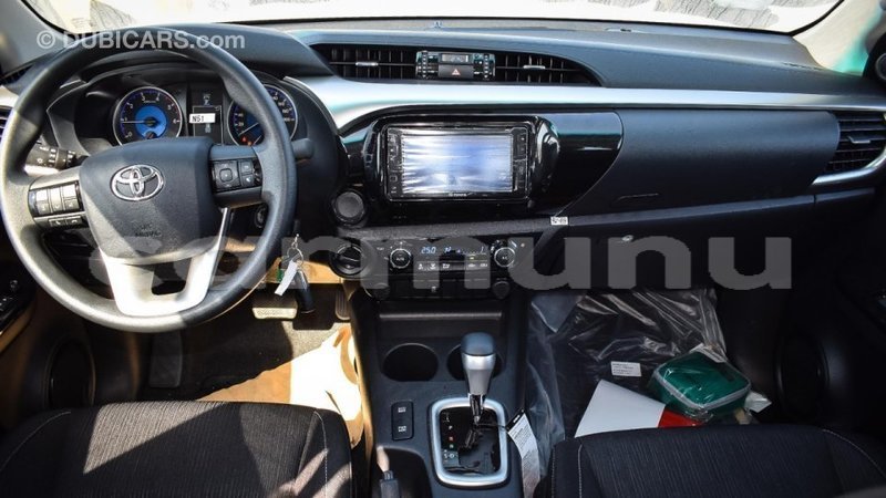 Big with watermark toyota hilux region of bouenza import dubai 3019