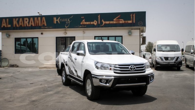 Big with watermark toyota hilux region of bouenza import dubai 3021