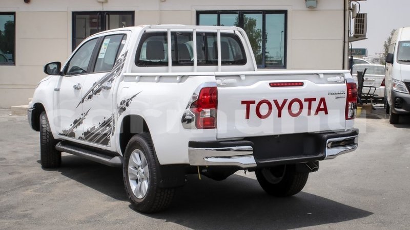 Big with watermark toyota hilux region of bouenza import dubai 3021