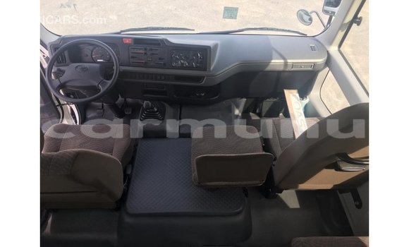 Buy Import Toyota Coaster White Car in Import - Dubai in Region of Bouenza Buy Import Toyota Coaster White Car in Import - Dubai in Region of Bouenza