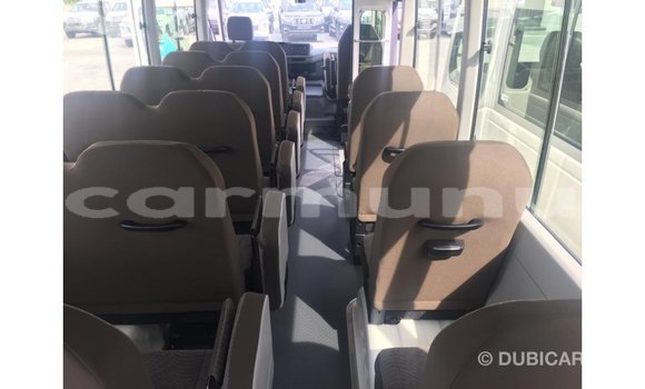 Buy Import Toyota Coaster White Car in Import - Dubai in Region of Bouenza Buy Import Toyota Coaster White Car in Import - Dubai in Region of Bouenza