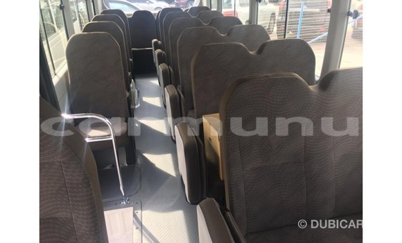 Buy Import Toyota Coaster White Car in Import - Dubai in Region of Bouenza Buy Import Toyota Coaster White Car in Import - Dubai in Region of Bouenza