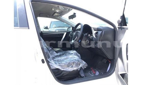 Buy Import Toyota Corolla White Car in Import - Dubai in Region of Bouenza Buy Import Toyota Corolla White Car in Import - Dubai in Region of Bouenza