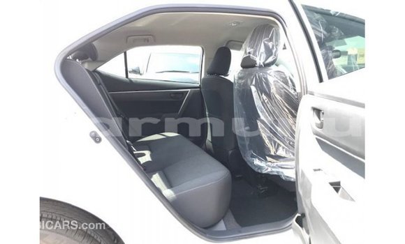 Buy Import Toyota Corolla White Car in Import - Dubai in Region of Bouenza Buy Import Toyota Corolla White Car in Import - Dubai in Region of Bouenza