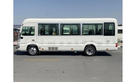 Buy Import Toyota Coaster White Car in Import - Dubai in Region of Bouenza Buy Import Toyota Coaster White Car in Import - Dubai in Region of Bouenza