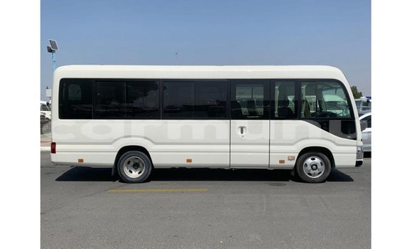 Buy Import Toyota Coaster White Car in Import - Dubai in Region of Bouenza Buy Import Toyota Coaster White Car in Import - Dubai in Region of Bouenza