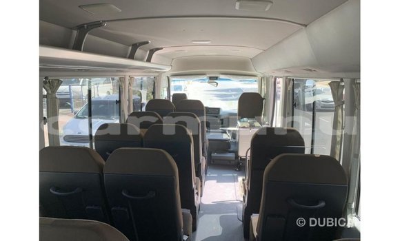 Buy Import Toyota Coaster White Car in Import - Dubai in Region of Bouenza Buy Import Toyota Coaster White Car in Import - Dubai in Region of Bouenza