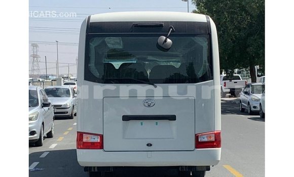 Buy Import Toyota Coaster White Car in Import - Dubai in Region of Bouenza Buy Import Toyota Coaster White Car in Import - Dubai in Region of Bouenza