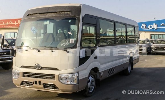 Buy Import Toyota Coaster White Car in Import - Dubai in Region of Bouenza Buy Import Toyota Coaster White Car in Import - Dubai in Region of Bouenza
