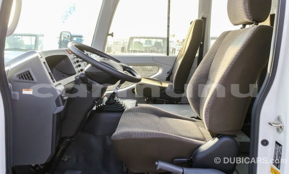 Buy Import Toyota Coaster White Car in Import - Dubai in Region of Bouenza Buy Import Toyota Coaster White Car in Import - Dubai in Region of Bouenza