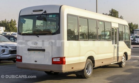 Buy Import Toyota Coaster White Car in Import - Dubai in Region of Bouenza Buy Import Toyota Coaster White Car in Import - Dubai in Region of Bouenza