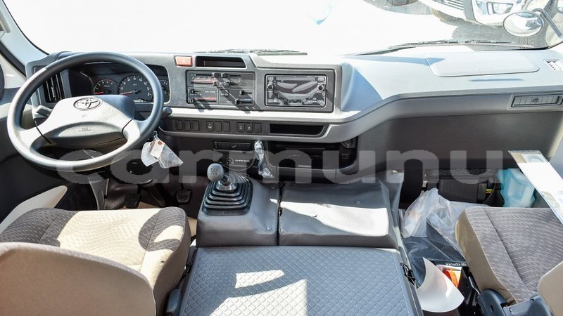 Big with watermark toyota coaster region of bouenza import dubai 3527