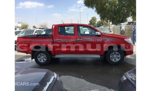 Buy Import Toyota Hilux Red Car in Import - Dubai in Region of Bouenza Buy Import Toyota Hilux Red Car in Import - Dubai in Region of Bouenza