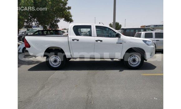 Buy Import Toyota Hilux White Car in Import - Dubai in Region of Bouenza Buy Import Toyota Hilux White Car in Import - Dubai in Region of Bouenza