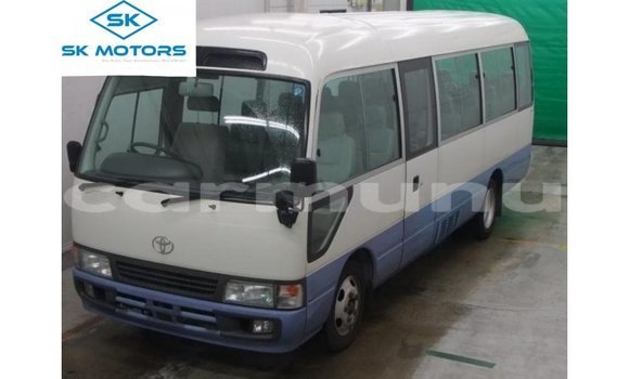 Acheter Import Voiture Toyota Coaster Blanc à Import - Dubai, Région de la Bouenza