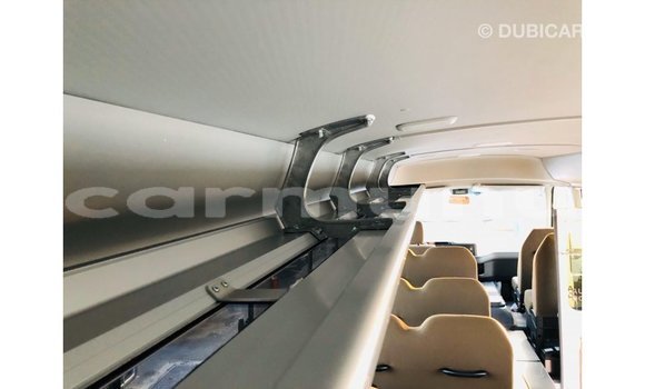 Buy Import Toyota Coaster White Car in Import - Dubai in Region of Bouenza Buy Import Toyota Coaster White Car in Import - Dubai in Region of Bouenza