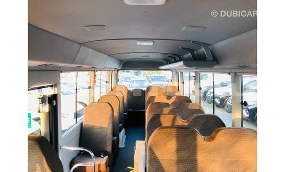 Buy Import Toyota Coaster White Car in Import - Dubai in Region of Bouenza Buy Import Toyota Coaster White Car in Import - Dubai in Region of Bouenza
