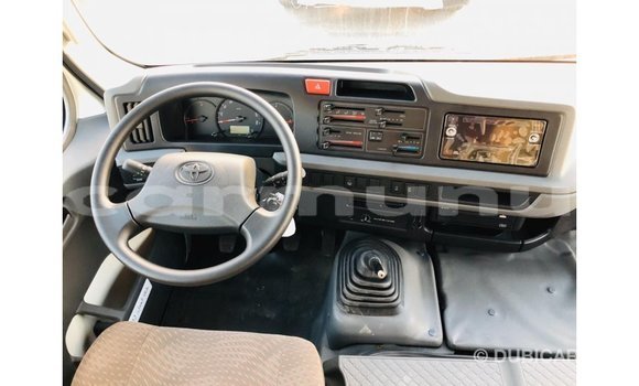 Buy Import Toyota Coaster White Car in Import - Dubai in Region of Bouenza Buy Import Toyota Coaster White Car in Import - Dubai in Region of Bouenza