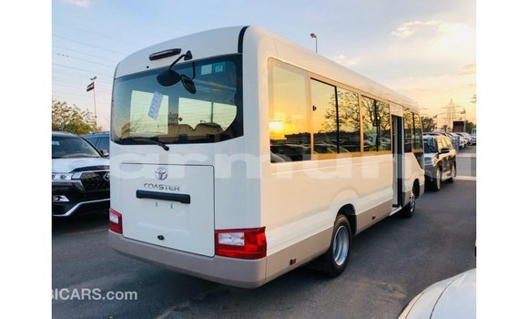 Buy Import Toyota Coaster White Car in Import - Dubai in Region of Bouenza Buy Import Toyota Coaster White Car in Import - Dubai in Region of Bouenza