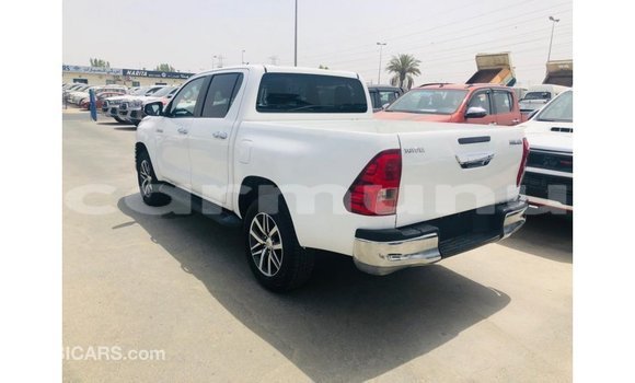 Buy Import Toyota Hilux White Car in Import - Dubai in Region of Bouenza Buy Import Toyota Hilux White Car in Import - Dubai in Region of Bouenza