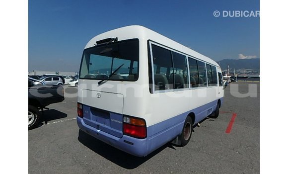 Buy Import Toyota Coaster White Car in Import - Dubai in Region of Bouenza Buy Import Toyota Coaster White Car in Import - Dubai in Region of Bouenza