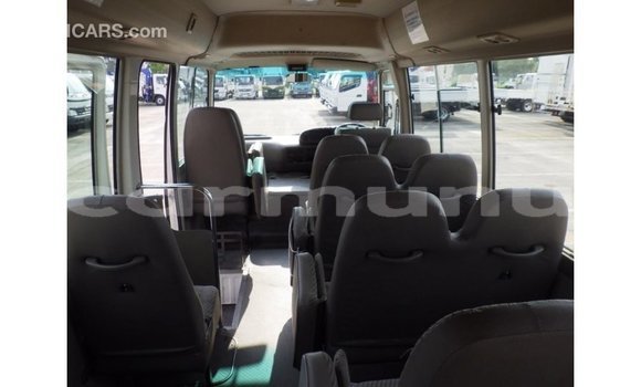 Buy Import Toyota Coaster White Car in Import - Dubai in Region of Bouenza Buy Import Toyota Coaster White Car in Import - Dubai in Region of Bouenza