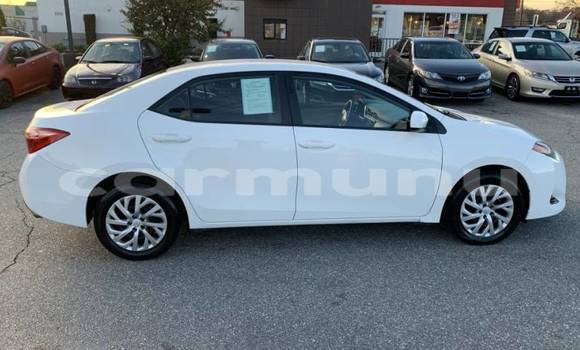 Buy Import Toyota Corolla White Car in Brazzaville in Municipality of Brazzaville Buy Import Toyota Corolla White Car in Brazzaville in Municipality of Brazzaville