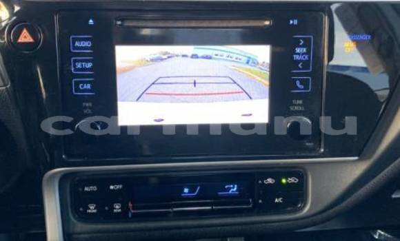 Buy Import Toyota Corolla White Car in Brazzaville in Municipality of Brazzaville Buy Import Toyota Corolla White Car in Brazzaville in Municipality of Brazzaville