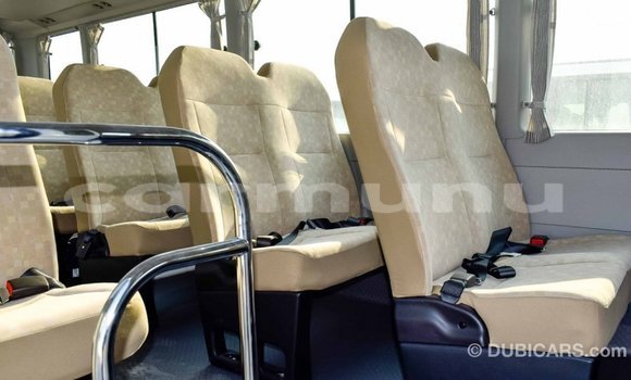 Buy Import Toyota Coaster White Car in Import - Dubai in Region of Bouenza Buy Import Toyota Coaster White Car in Import - Dubai in Region of Bouenza