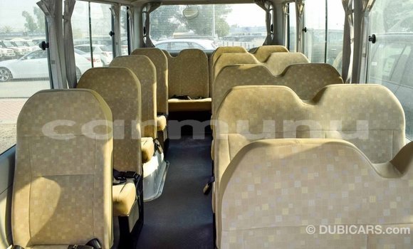 Buy Import Toyota Coaster White Car in Import - Dubai in Region of Bouenza Buy Import Toyota Coaster White Car in Import - Dubai in Region of Bouenza